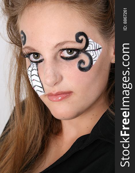 Close-up of Halloween teenager with face paint