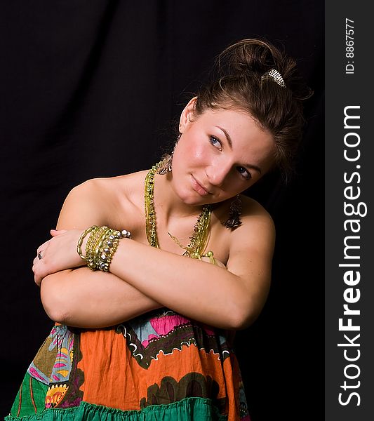Nice young girl against a black background. Nice young girl against a black background