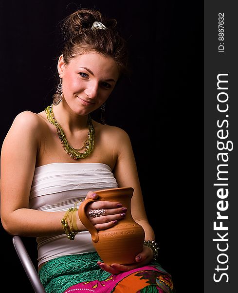 Nice young girl against a black background. Nice young girl against a black background