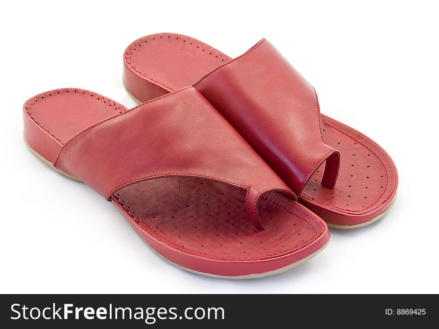 Fashionable red female sandal isolated on white background. Fashionable red female sandal isolated on white background