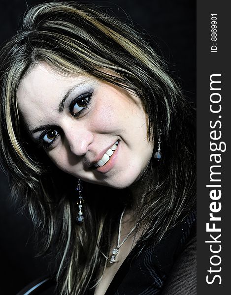 Studio Shot of a brunette woman with big brown eyes, isolated on white background. Studio Shot of a brunette woman with big brown eyes, isolated on white background