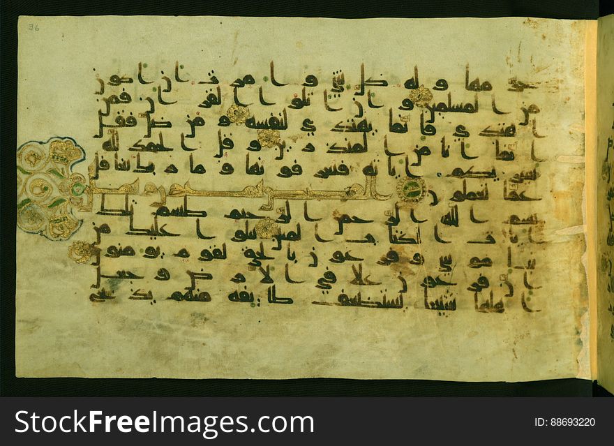 This horizontal-format manuscript on parchment is a collection of illuminated fragments of the Qur&#x27;an, dating to the late third century AH / ninth CE and possibly to the fifth century AH / eleventh CE. The earlier text is written in an Early Abbasid &#x28;Kufic&#x29; script, and the later text is in a hand influenced by the New Abbasid &#x28;broken cursive&#x29; style. Both are in dark brown ink and vocalized with red dots. The codex opens with an illuminated frontispiece &#x28;fol. 1a&#x29; of geometric design and closes with a similarly decorated finispiece &#x28;fol. 77b&#x29;. Illuminated forms include chapter headings in gold ink with polychrome palmettes extending into the margin, tashdīds highlighted in gold ink, and verse markers for individual verses and groups of five and ten verses. The blind-tooled black goatskin binding, which is attributable to Egypt, is an important example of early Islamic bookbinding. See this manuscript page by page at the Walters Art Museum website: art.thewalters.org/viewwoa.aspx?id=31211. This horizontal-format manuscript on parchment is a collection of illuminated fragments of the Qur&#x27;an, dating to the late third century AH / ninth CE and possibly to the fifth century AH / eleventh CE. The earlier text is written in an Early Abbasid &#x28;Kufic&#x29; script, and the later text is in a hand influenced by the New Abbasid &#x28;broken cursive&#x29; style. Both are in dark brown ink and vocalized with red dots. The codex opens with an illuminated frontispiece &#x28;fol. 1a&#x29; of geometric design and closes with a similarly decorated finispiece &#x28;fol. 77b&#x29;. Illuminated forms include chapter headings in gold ink with polychrome palmettes extending into the margin, tashdīds highlighted in gold ink, and verse markers for individual verses and groups of five and ten verses. The blind-tooled black goatskin binding, which is attributable to Egypt, is an important example of early Islamic bookbinding. See this manuscript page by page at the Walters Art Museum website: art.thewalters.org/viewwoa.aspx?id=31211