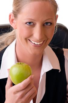Young Woman Holds An Apple In Her Hand Stock Images