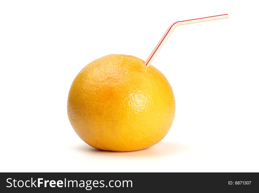 Grapefruit with straw isolated on white.  Idea of nature products, juices and healthy eating.