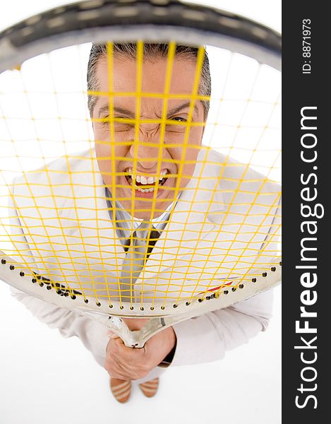 Top view of boss holding tennis racket on white background