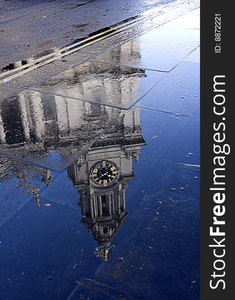 A reflection of church in a wet street. A reflection of church in a wet street