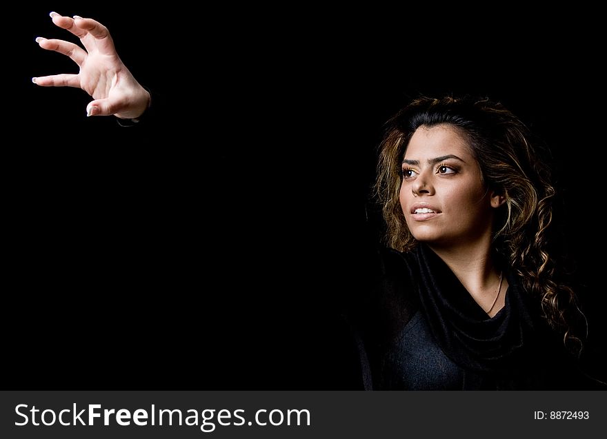 Portrait of beautiful female showing hand gesture