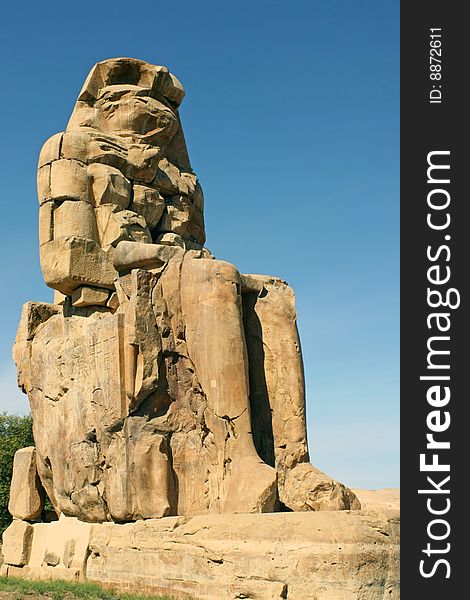 Ancient sculpture of pharaon Memnon's Colossus