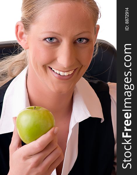 Young woman holds an apple in her hand