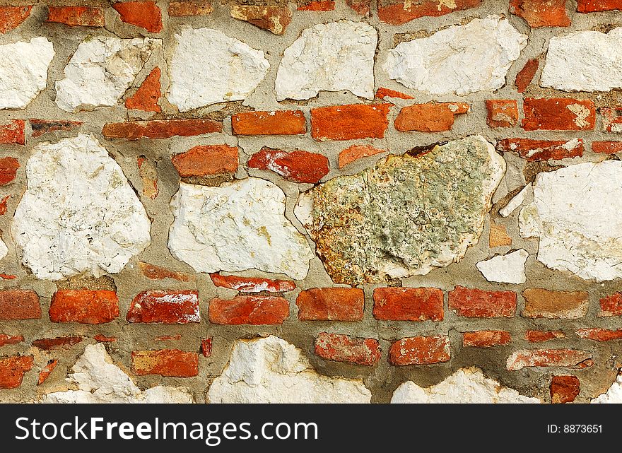 Rough wall from bricks and stones. Rough wall from bricks and stones