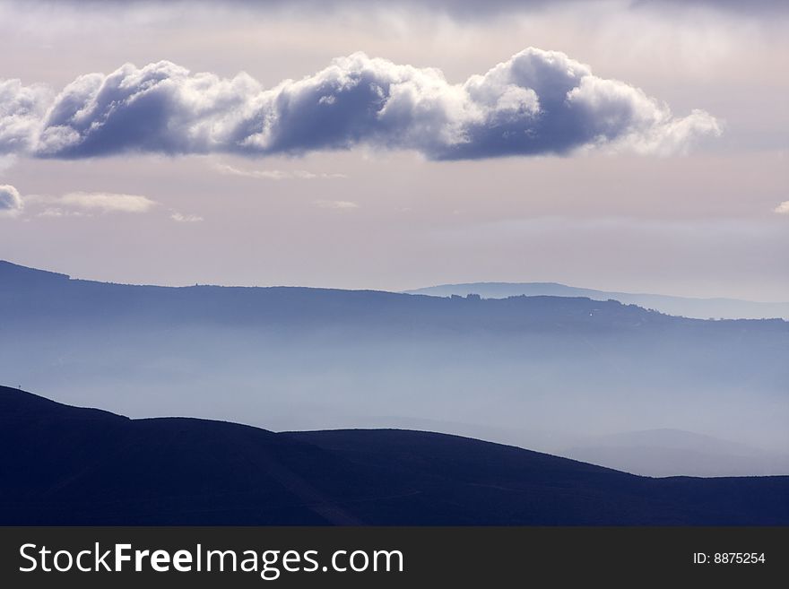 Blue mountains and clouds sunrise landscape