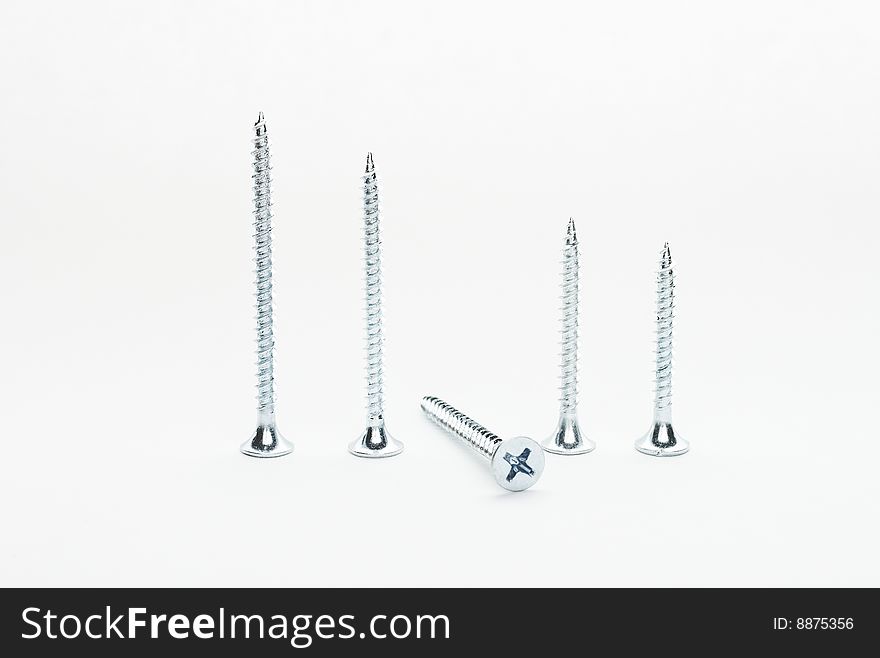 Five self drilling screws standing on it hats