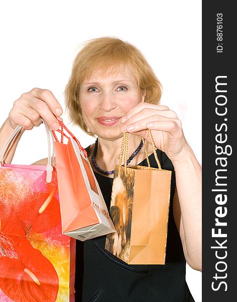 Woman with packages is insulated on white background. Woman with packages is insulated on white background
