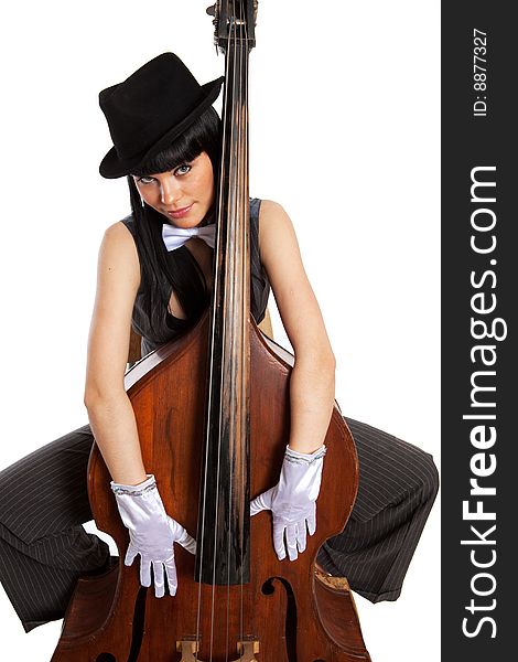 Young beautiful brunette with old contrabass