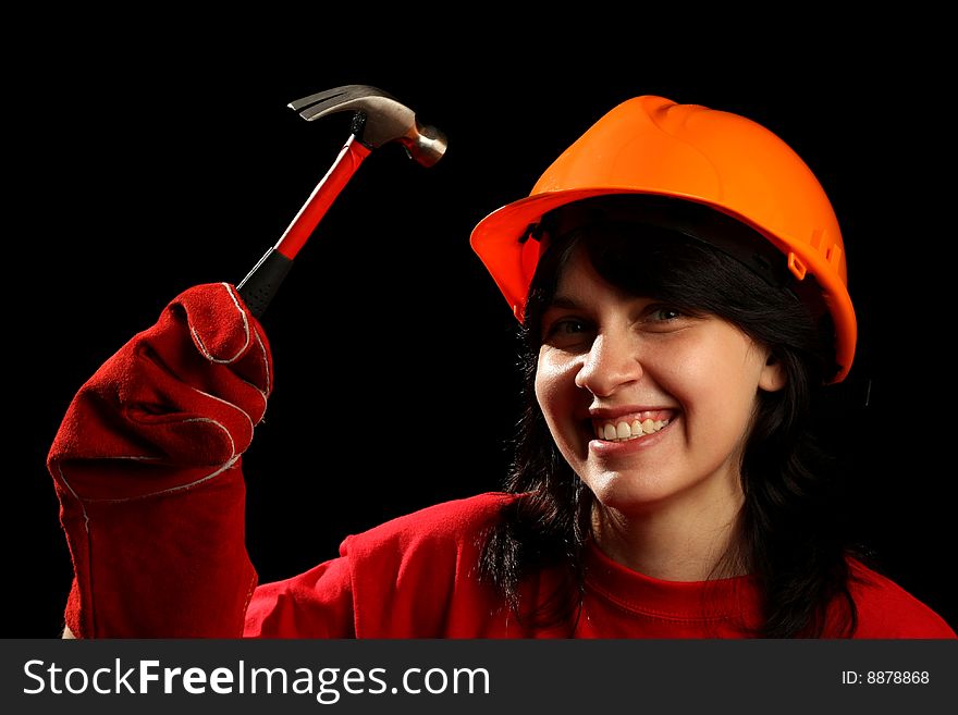 Young woman with work tools, isolated on black