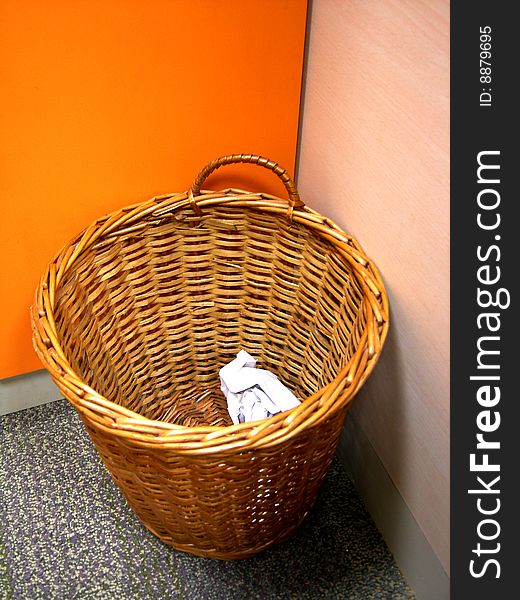 A dustbin kept in the corner. A dustbin kept in the corner.