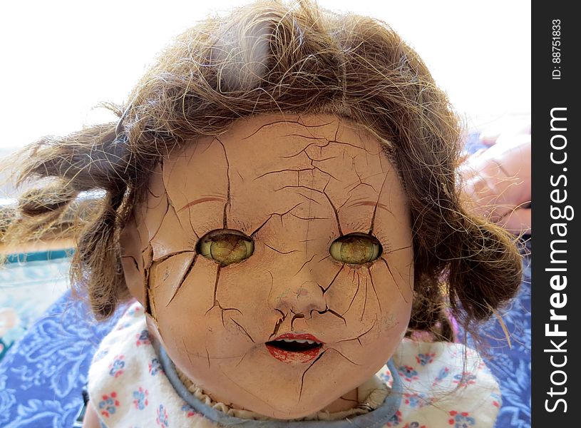 cracked doll head