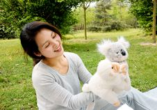 Mother Playing Plush Toys With Son Royalty Free Stock Images