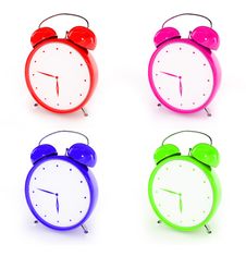 Bright Plastic Alarm Clocks Stock Image