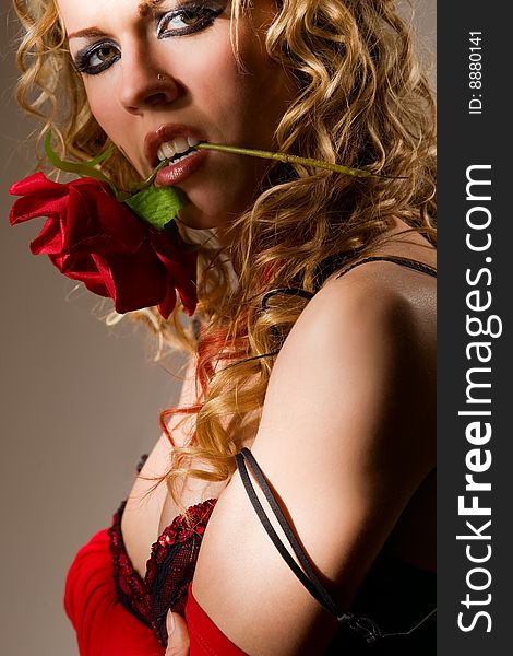 Hispanic style erotic portrait with red rose. Hispanic style erotic portrait with red rose