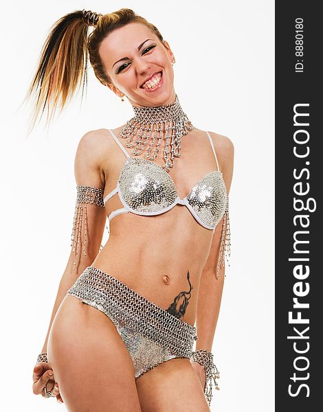 Smiling female dancer wearing glossy performance clothing. Smiling female dancer wearing glossy performance clothing