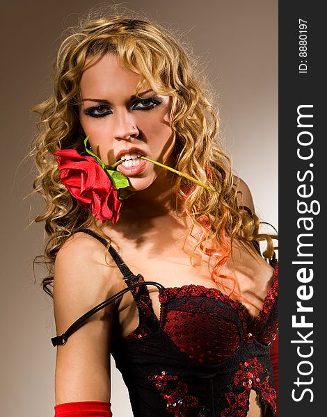 Hispanic style erotic portrait with red rose. Hispanic style erotic portrait with red rose