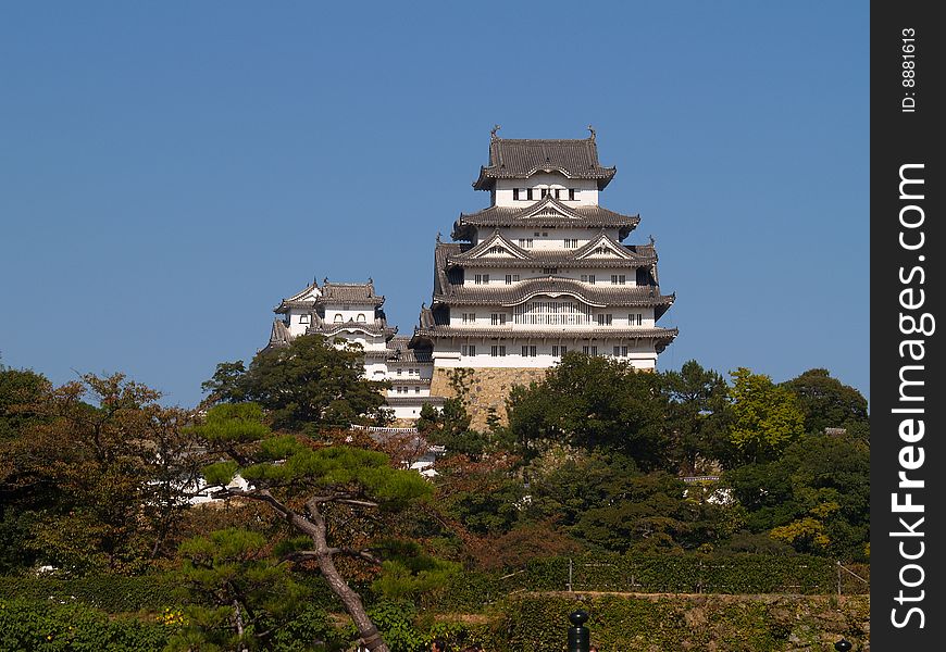 Front view of Himeji Castle from the entrance on a sunny day