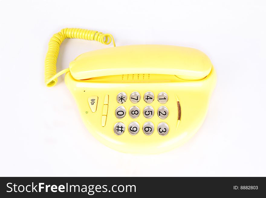 Yellow telephone with  isolated on white background