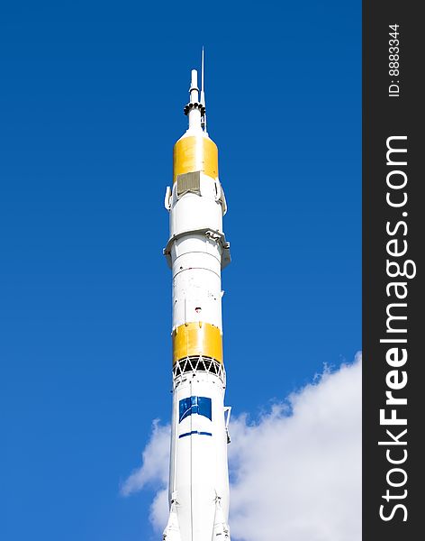 White spaceship - launcher against a background of blue sky