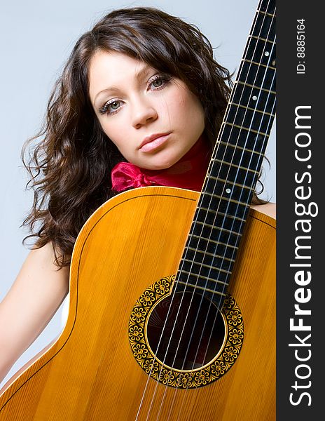 Brunette With Guitar