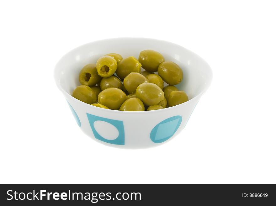 Green olives fruit on the plate isolated over white background