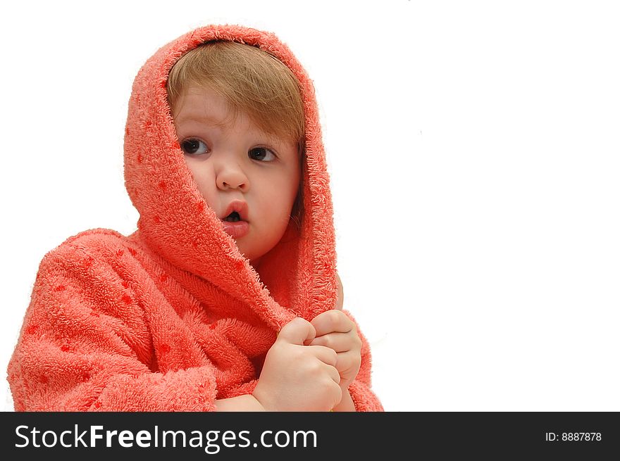 Portrait of the little girl in a dressing gown