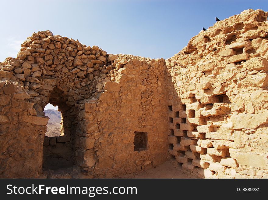 Ruined stone wall in Masada fortress, Israel. Ruined stone wall in Masada fortress, Israel