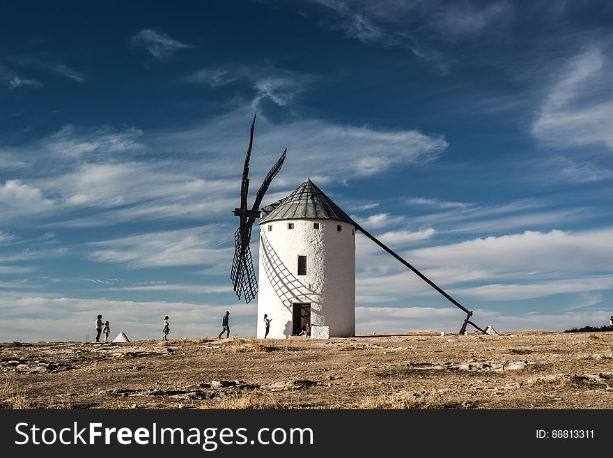 White And Black Windmill Building