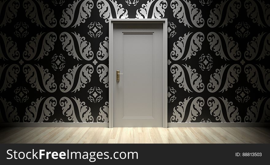 A room with a decorative wallpaper and door. A room with a decorative wallpaper and door.