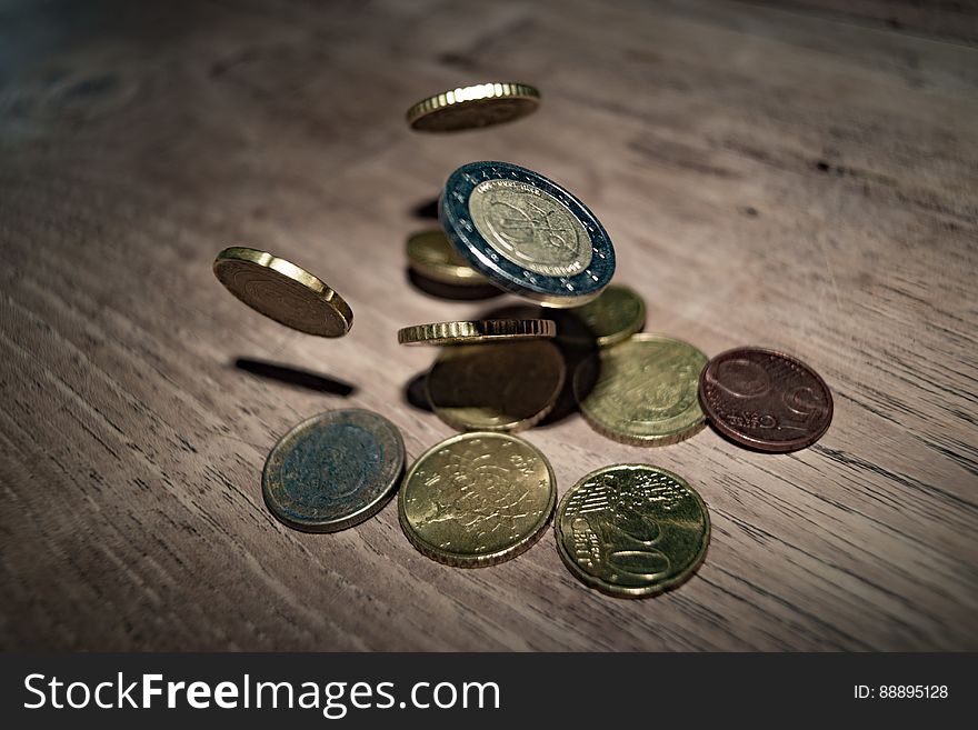 Close-up of Coins on Table