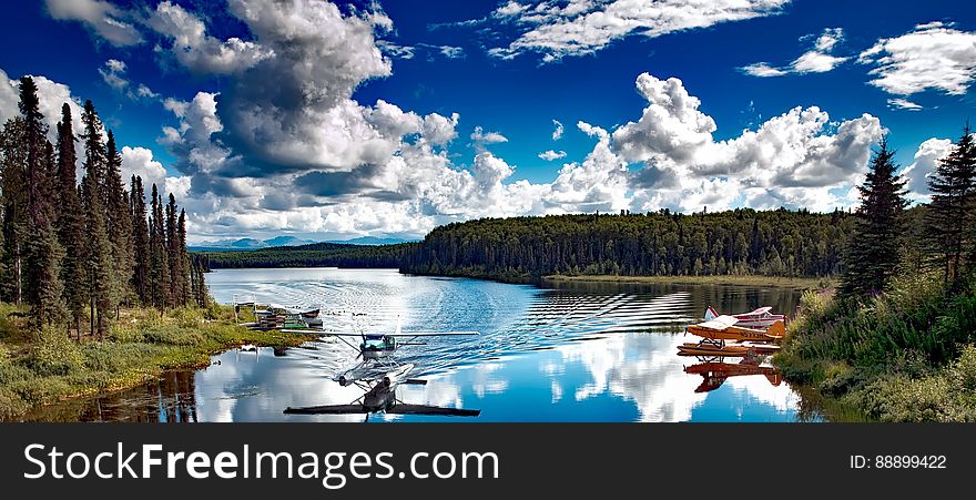 Floatplane Landing On Lake