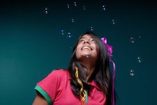 Soap Bubble Blowing Downwards On The Head Of Girl Stock Photography Soap Bubble Blowing Downwards On The Head Of Girl Stock Photography