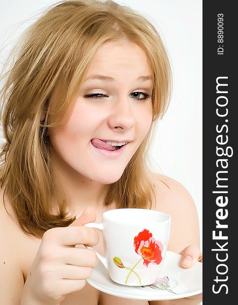 Young woman with a cup of hot drink