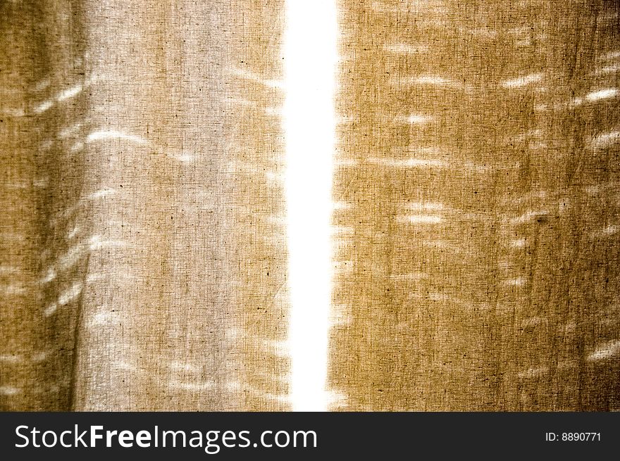 Images of light coming into the room through the window through the blinds unbleached cotton. Images of light coming into the room through the window through the blinds unbleached cotton