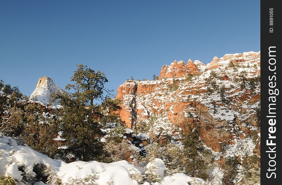 Snow, red rocks. Zion National Park, Cold country awesome scenery- Southern Utah- blue skies, canyon, cliff, icicle, Christmas 2008, trees. Snow, red rocks. Zion National Park, Cold country awesome scenery- Southern Utah- blue skies, canyon, cliff, icicle, Christmas 2008, trees