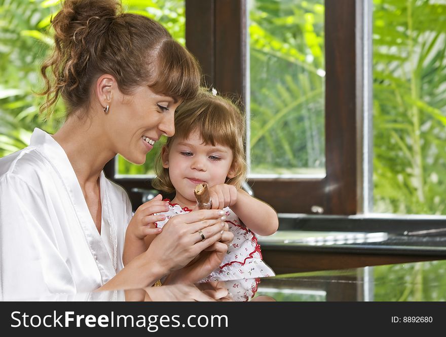 Portrait of beautiful young woman with her daughter. Portrait of beautiful young woman with her daughter