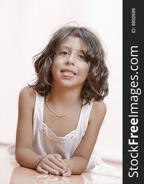 Studio portrait of nice little girl having good time. Studio portrait of nice little girl having good time