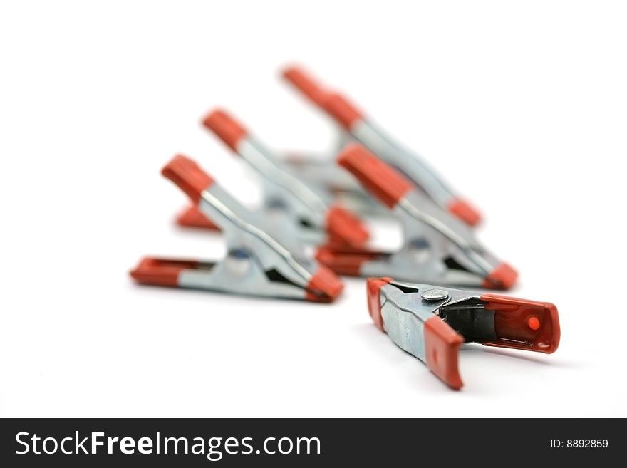 Six red color clamps background