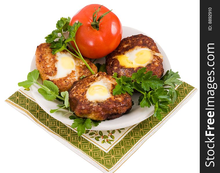 Cutlets from meat hens with fried eggs. Eggs of a female quail. Cutlets from meat hens with fried eggs. Eggs of a female quail.