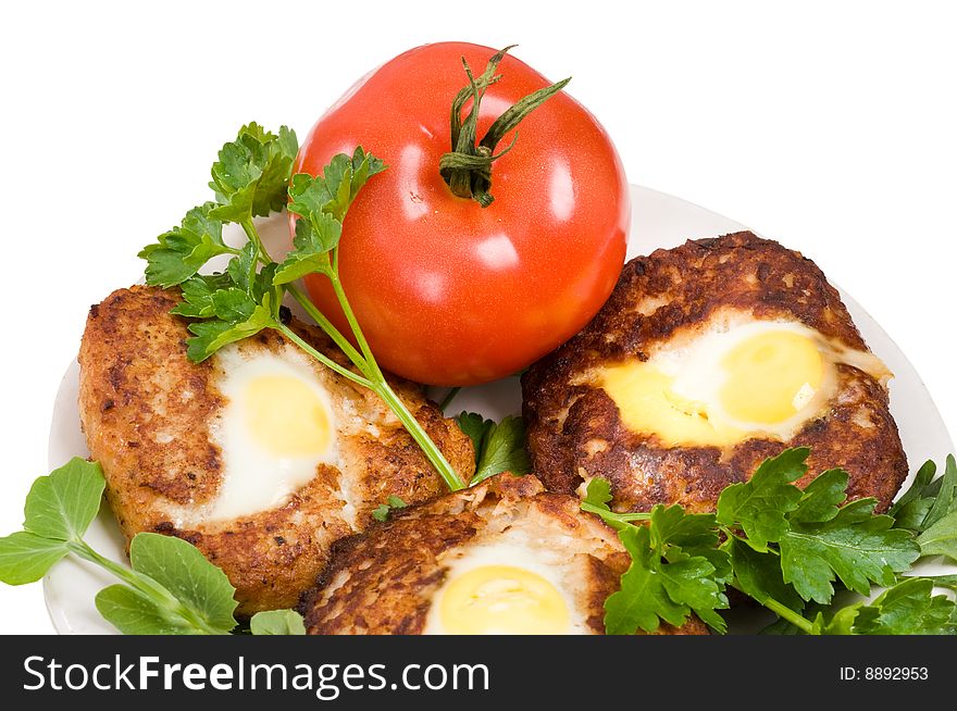 Cutlets from meat hens with fried eggs. Eggs of a female quail. Cutlets from meat hens with fried eggs. Eggs of a female quail.