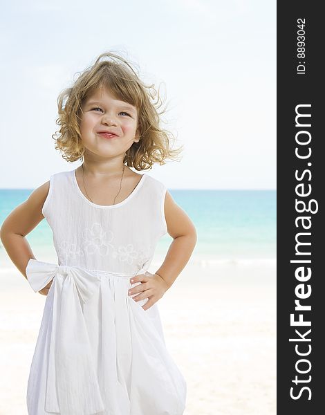 Portrait of little white girl having fun on the beach. Portrait of little white girl having fun on the beach
