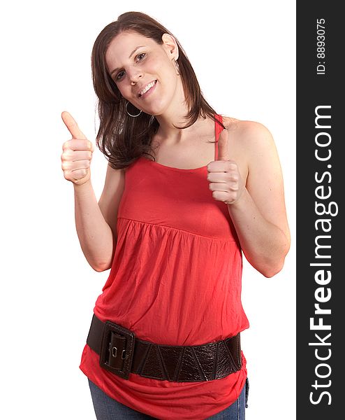 Young woman is showing a thumbs up sign. Young woman is showing a thumbs up sign.