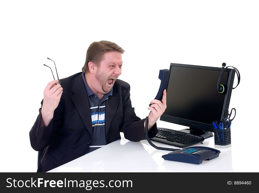 Angry Businessman On Desk