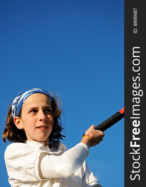 Closeup of girl playing tennis